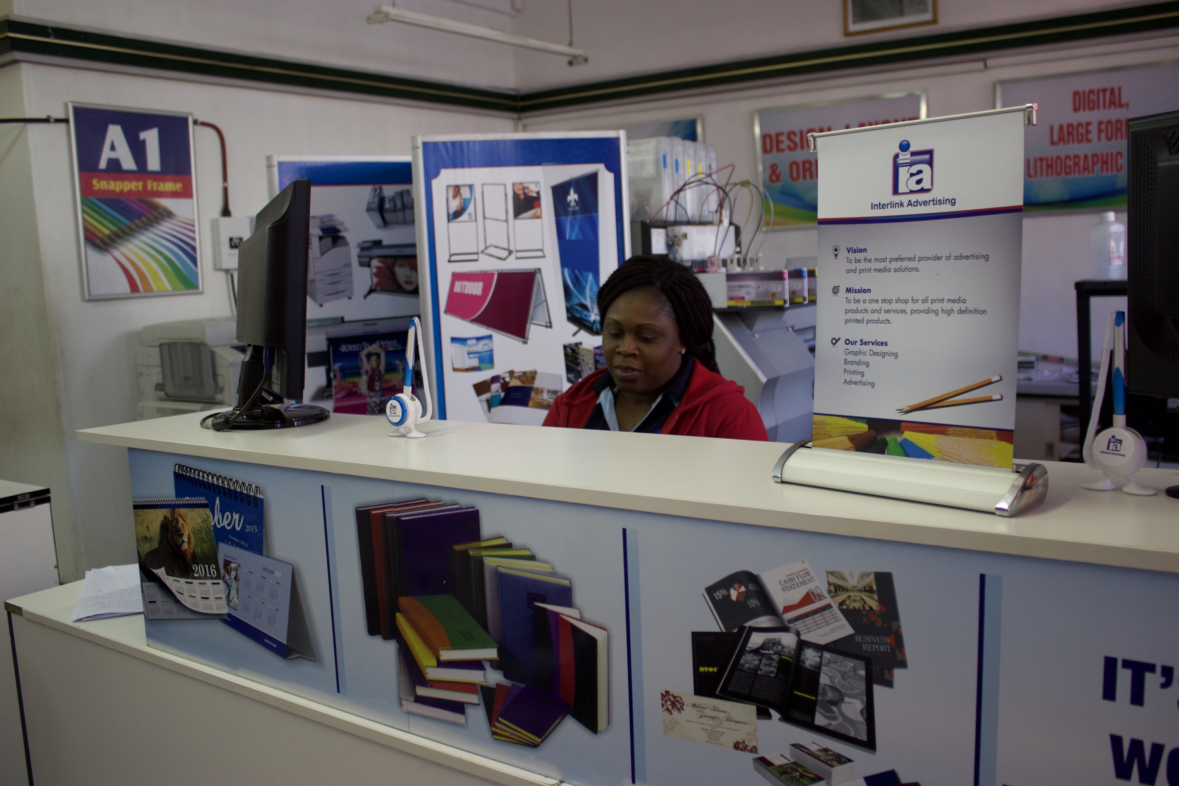 Simply Accounting team member at a local business counter